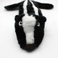 Peluche para perros con forma de zorrillo